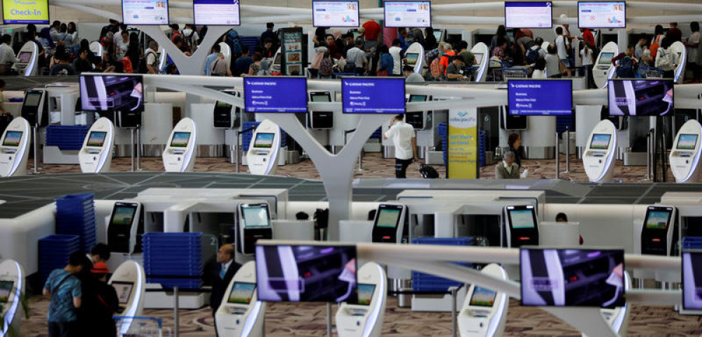 Automata becsekkolás a Changi repülőtéren